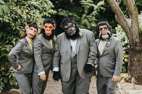 Four people in gorilla masks including Jorge (second right).