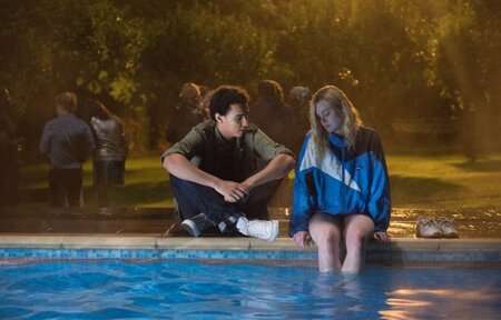 Archie Madekwe (Luke) with Elle Fanning (Violet Valenski) in Teen Spirit.