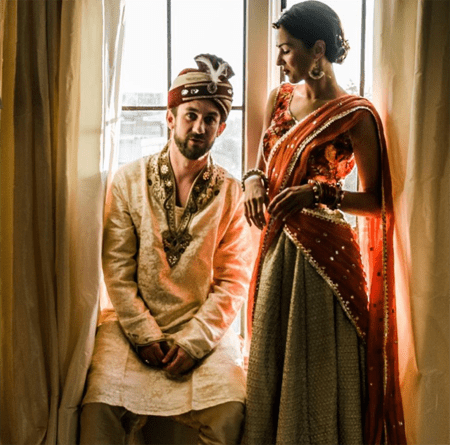 Annet Mahendru and her husband in Indian wedding dress.