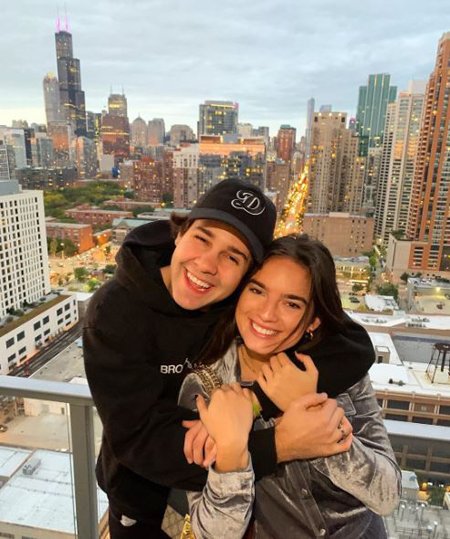 David Dobrik and Natalie Noel are childhood friends but fans are reading between the lines when it comes to their relationship.