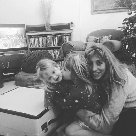 Daisy Haggard with her two daughters.