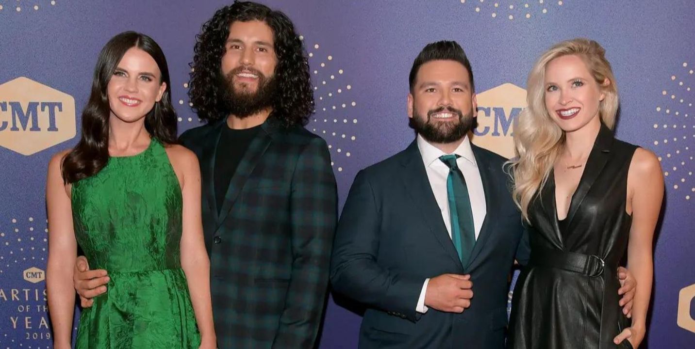 Dan and Shay with their respective wives. celebsindepth.com