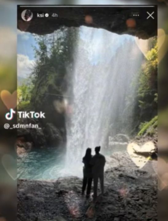 Ksi with his girlfriend under a waterfall. celebsindepth.com