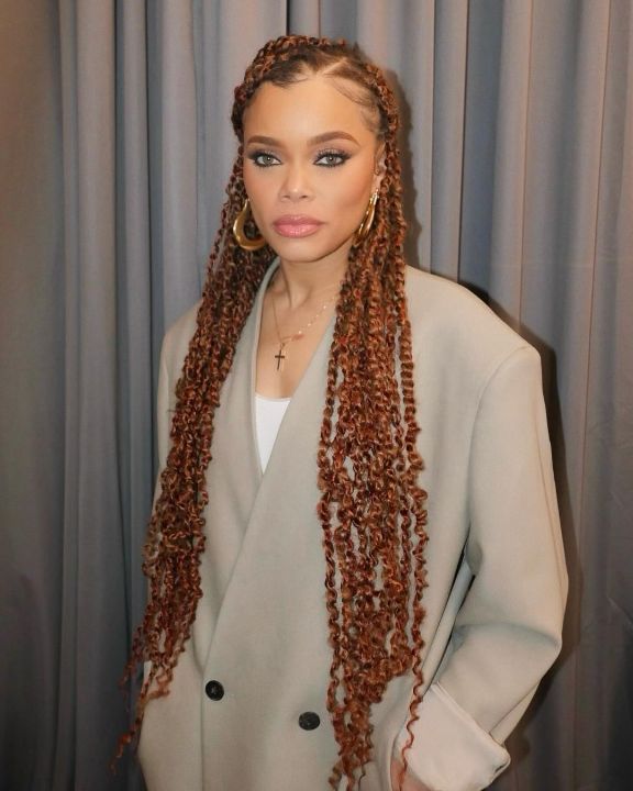 Andra Day's recent appearance in the Super Bowl shows her transformation.  celebsindepth.com