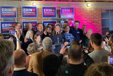 Erin Mendenhall at her Mayoral campaign party with her children and husband, waiting for the results.