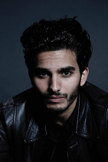 Mehdi Dehbi got his footing in acting by appearing in various stage plays; he even directed one.