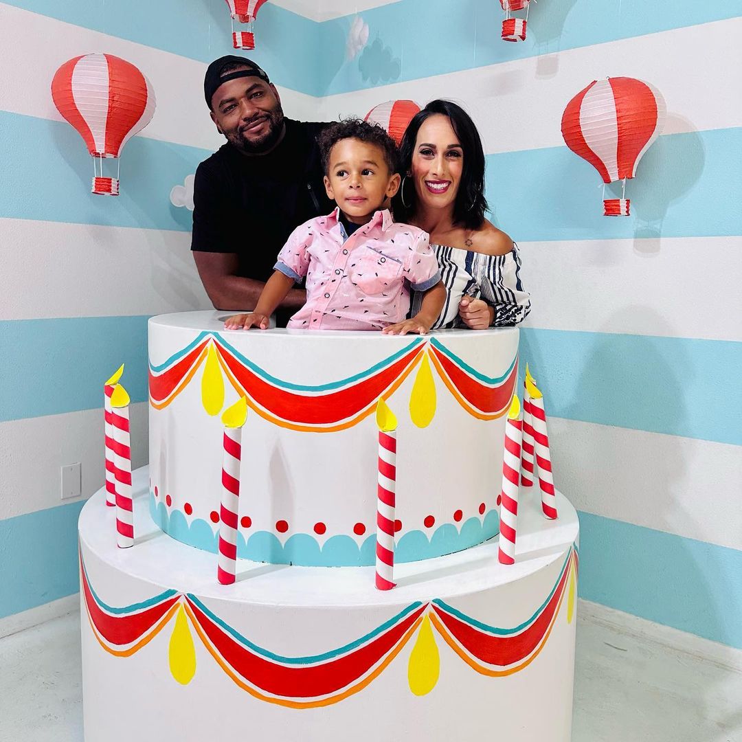 Angelo Dawkins and Grace Russo with their lil homie. celebsindepth.com 