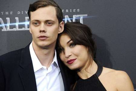 Alida is not married to Bill and he they are at a red carpet event.