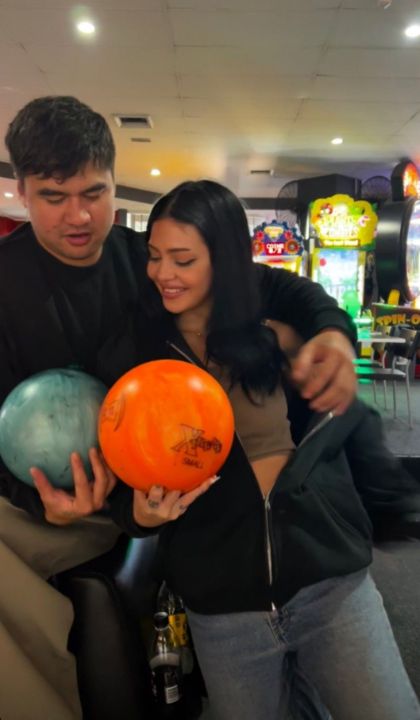 Calum Hood with his rumored girlfriend, Brandy Schwechler. celebsindepth.com
