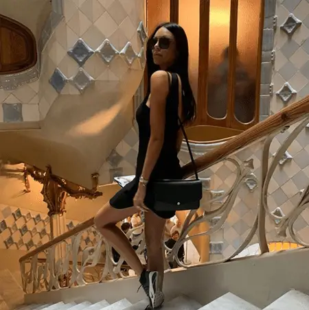 Candice van der Merwe walking down the stairs.