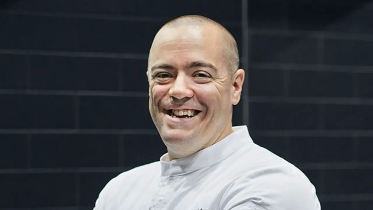 Chef Matt Abe's scar is visible on his left cheek. celebsindepth.com