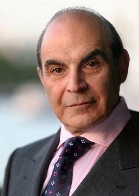 David Suchet looking into the camera.