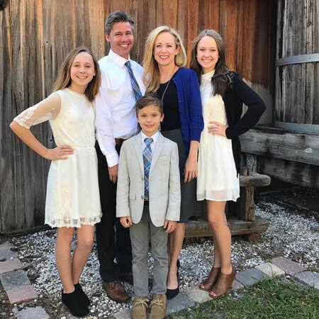 Jack Stanton with his parents, siblings, father, mother, and sisters.