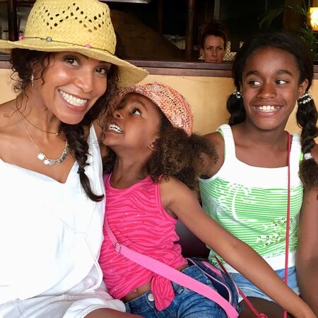 Colin Lawrence with his wife and kids, both daughters.