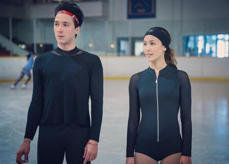 Kaitlyn Leeb and Johnny Weir as Leah Starnes and Gabriel “Gabe” Richardson, respectively, in the Netflix ice skating series Spinning Out (2020).