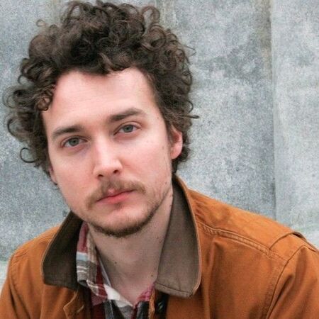 David H. Holmes portrays the character of Simon on High Fidelity Hulu (2020).