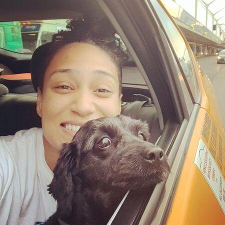Rosanny Zayas with her dog, Cody.