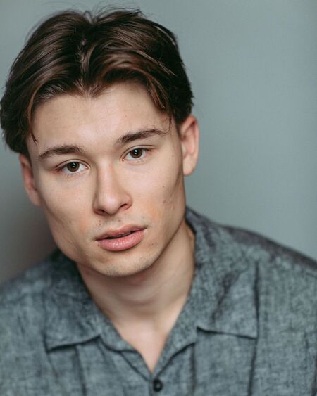 Phillip Lewitski plays Apollo on Utopia Falls Hulu (2020).