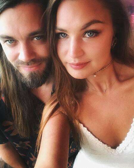 Walking Dead actor Tom Payne is engaged to his girlfriend turned fiancee Jennifer Akerman.