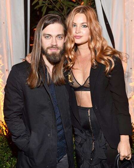 Walking Dead actor Tom Payne is dating girlfriend turned fiancee Jennifer Akerman; the couple is in a relationship since 2013.