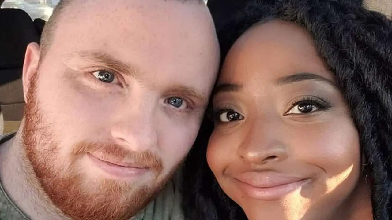 Garrett Foster and his girlfriend-turned-fiancée, Whitney Mitchell.