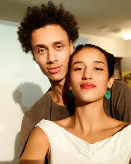 Yadira and her boyfriend Evan Morris Reiser taking a photo together.