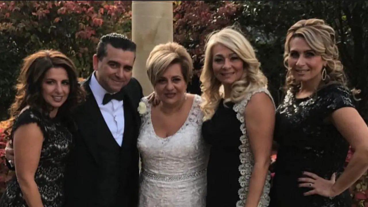Lisa Valastro with her sisters, Buddy Valastro and Mary. celebsindepth.com