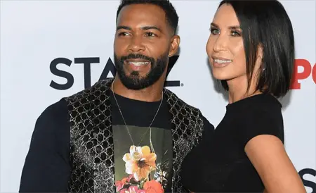 Omari Hardwick with his wife Jennifer Pfautch.