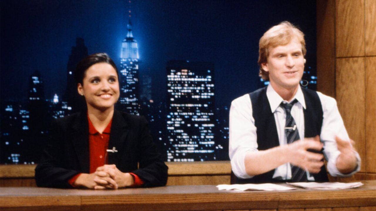 Julia and Brad hall on the set of SNL.