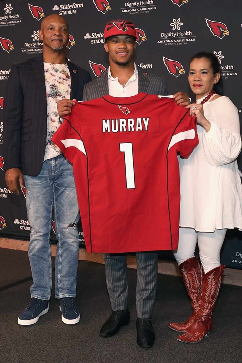 Kyler Murray with his parents.