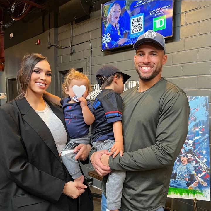 George Springer with his wife and kids.