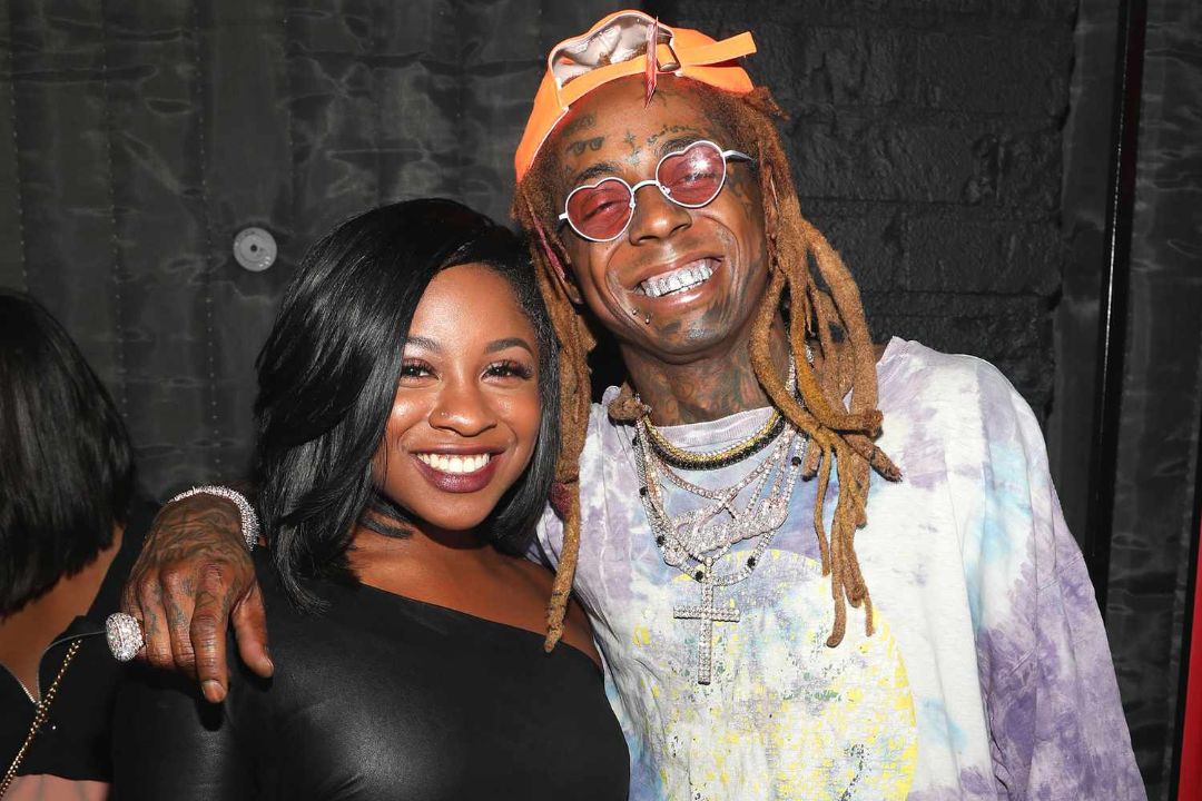 Lil Wayne with his daughter, Reginae Carter.