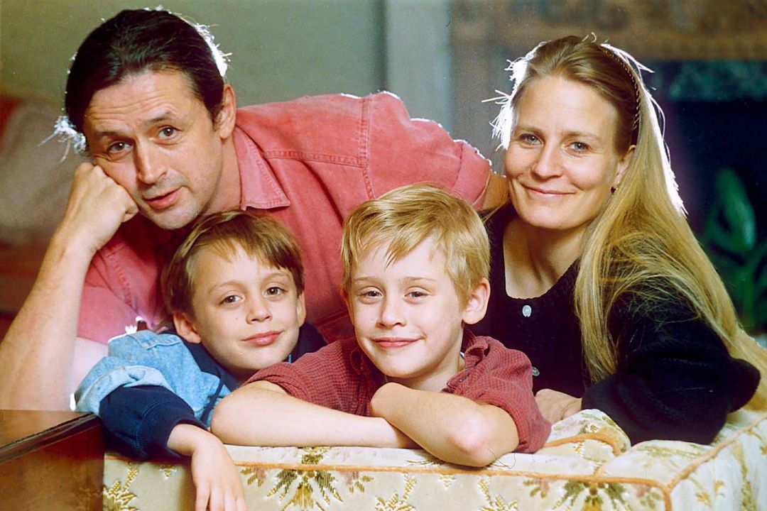 Macaulay Culkin with his parents and brother.