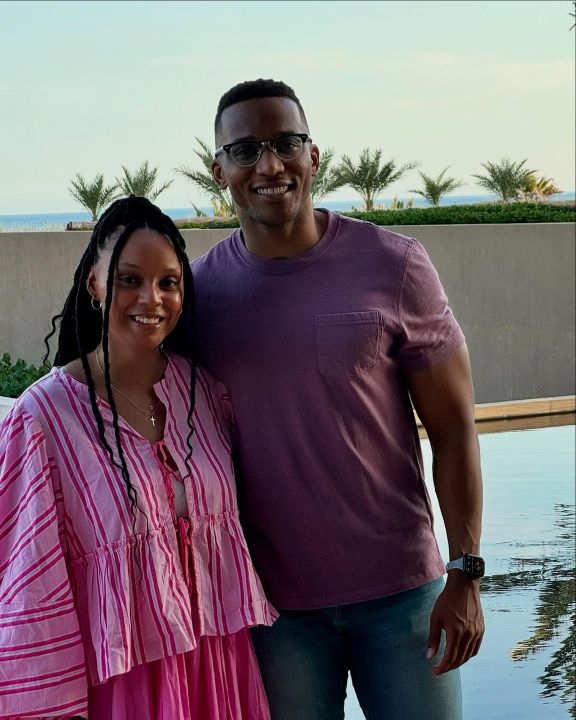 Christian Menefee with his wife, Kaitlyn Pennington-Hill Menefee.