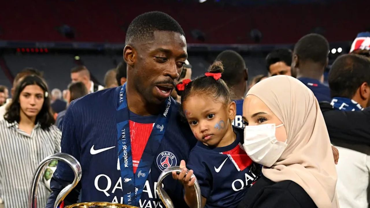 Ousmane Dembélé with his wife, Rima Edbouche, and their daughter.