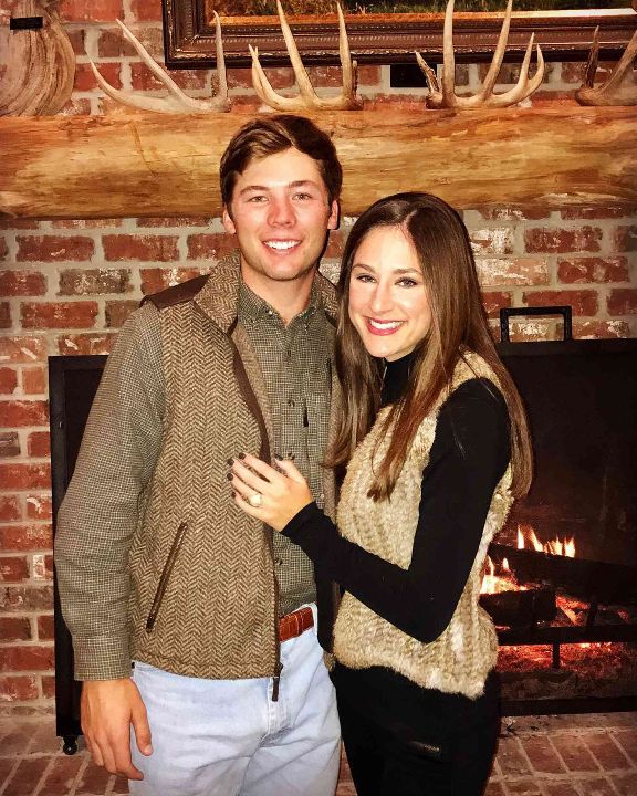 Sam Burns with his wife, Caroline Campbell.