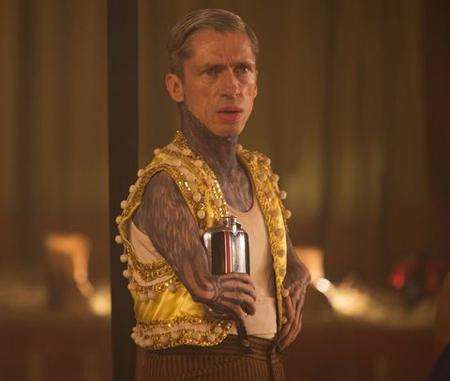 Mat Fraser in American Horror Story wearing performance clothes.