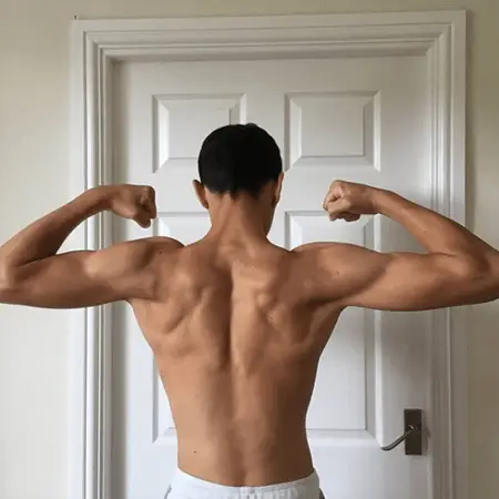 Daniel Frogson showing off his back and his trapezoid muscle.