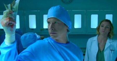Rob Huebel and Erinn Hayes as Dr. Owen Maestro and Dr. Lola Spratt, respectively, in Medical Police (2020).