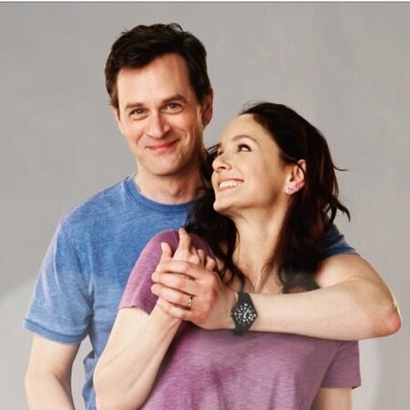 Tom Everett Scott and Sarah Wayne Callies as the husband and wife duo Scott Perry and Robin Perry, respectively, on the NBC drama Council of Dads.