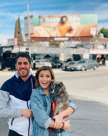 Taylor Misiak and her boyfriend Tony Yacenda share a pet dog named Fredo.