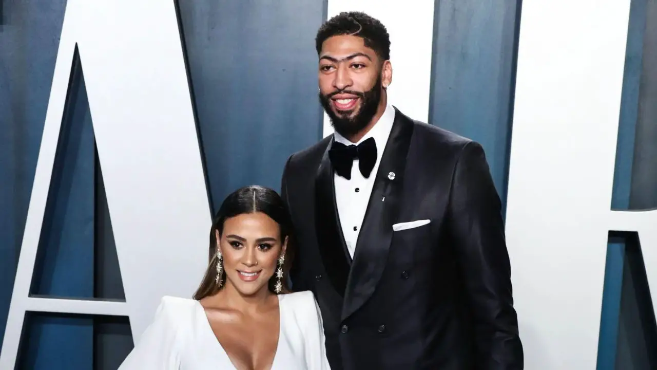 Anthony Davis with his wife, Marlen Polanco.