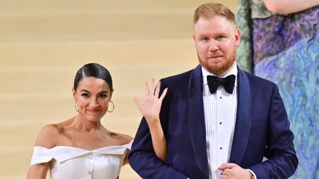 Alexandria Ocasio-Cortez and her husband-to-be, Riley Roberts.