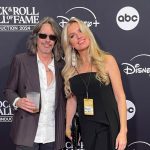 Kelly Hansen with his wife, Anna Hansen.