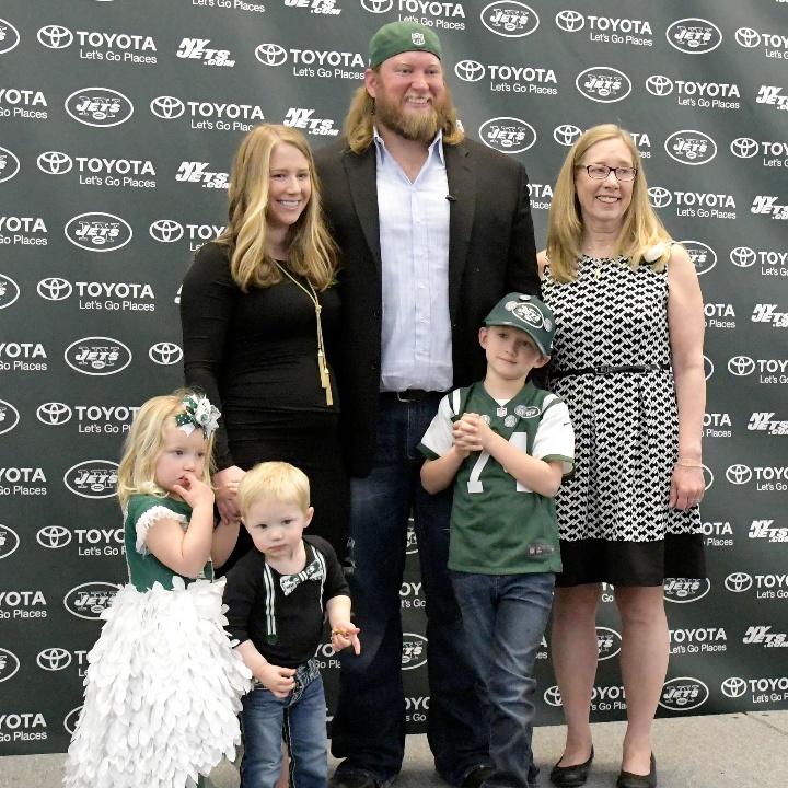 Nick Mangold with his wife, kids, and mother.