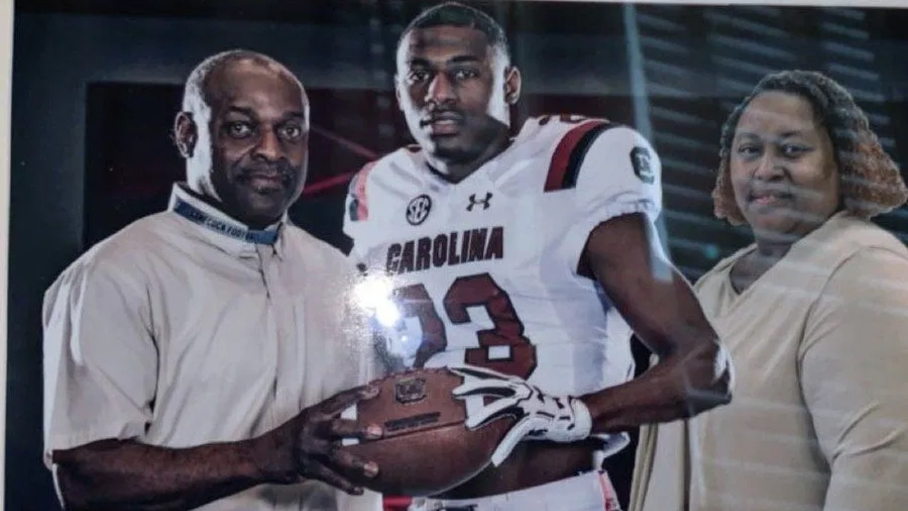 Xavier Legette with his parents.